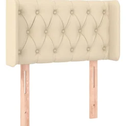 vidaXL Sänggavel med kanter gräddvit 83x16x78/88 cm tyg